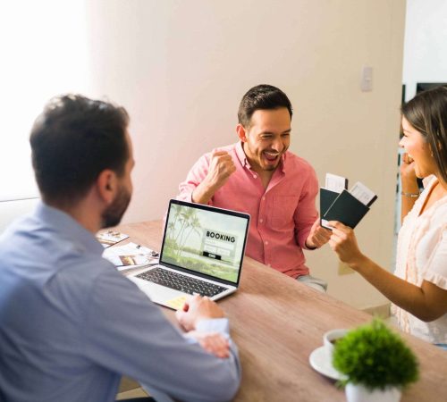 i-can-t-believe-we-are-going-vacations-excited-young-couple-celebrating-shouting-with-happiness-after-receiving-their-passports-plane-tickets-travel-agency (1)